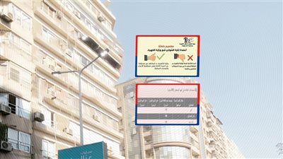 أعمدة إنارة مضاءة صباحا بحي الدقي في ظل دعوات ترشيد استهلاك الكهرباء